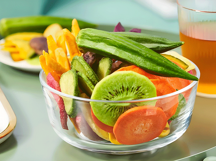 Transforming fruits and vegetables into snack foods using food machinery